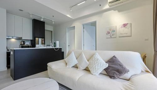 One-Bedroom Apartment with Balcony and City View