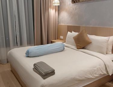 One-Bedroom Apartment with Balcony and City View