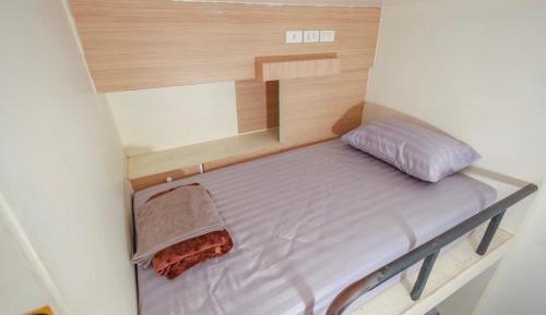 Single Bed in Female Dormitory Room