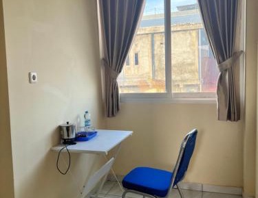Single Bed in Dormitory Room