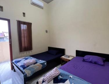 Single Bed in Female Dormitory Room