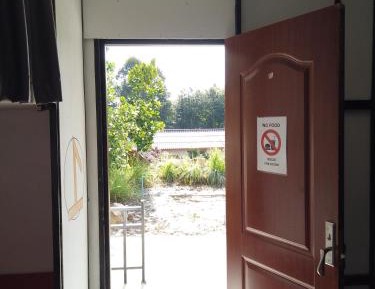 Single Bed in Dormitory Room