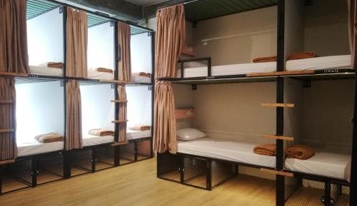 Single Bed in Dormitory Room