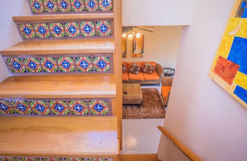 Gonzalo Guerrero Condo | Budget Penthouse. Walking Distance to Beach and Stores by BRIC Vacation Rentals