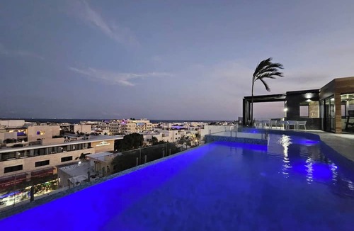 Gonzalo Guerrero Apartment | Chic Upper-Floor Condo with Rooftop Ocean Views Steps from Mamitas Beach 5th Ave